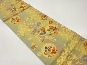 花々・蝶・丸文に梅・桜模様織出し袋帯